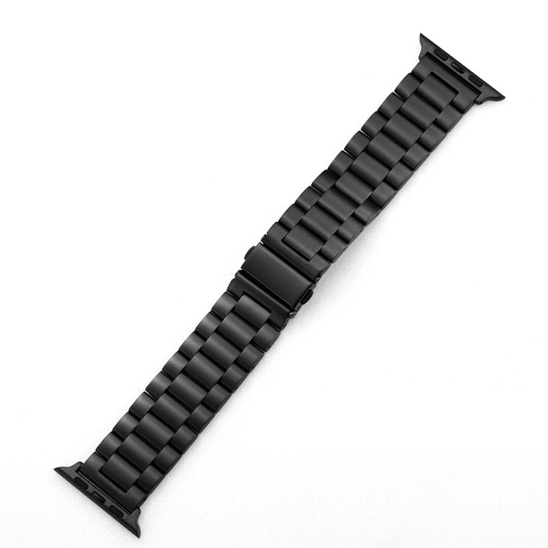 ChainLit metallic belt in rose gold – styled over a black dress