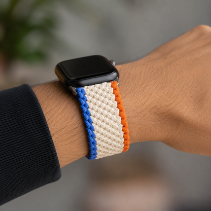 Premium braided Apple Watch strap in blue, cream and orange woven nylon with comfortable stretch design.