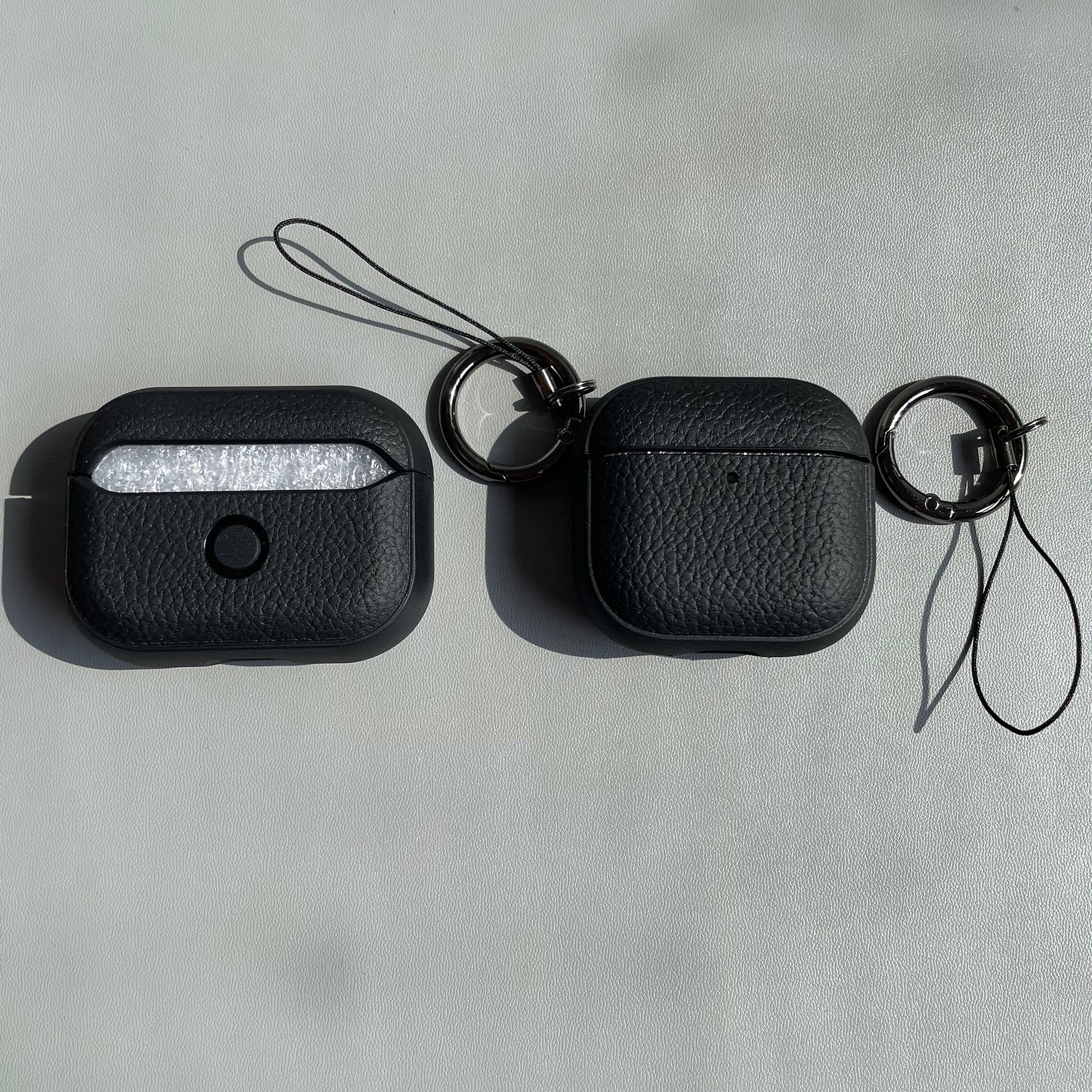 Navy AirPods Pro 2 case with clip-on loop and shock protection

